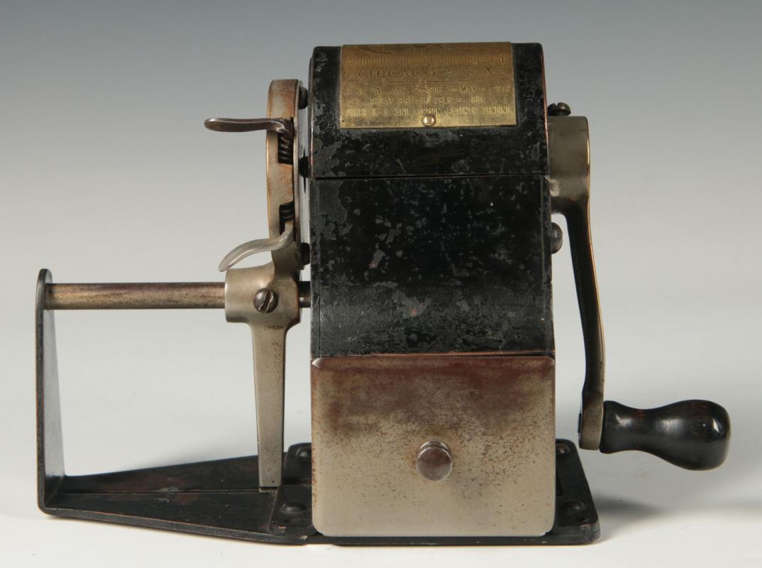 C. 1912 'CLIMAX' ANTIQUE PENCIL SHARPENER WITH FEEDER