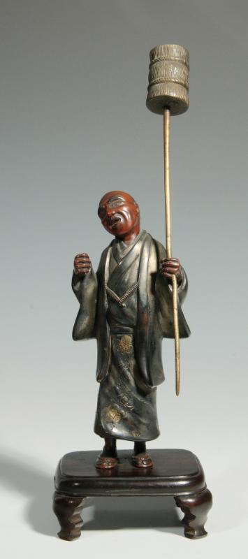 A 20TH C. JAPANESE PATINATED METAL MATSURI FIGURE