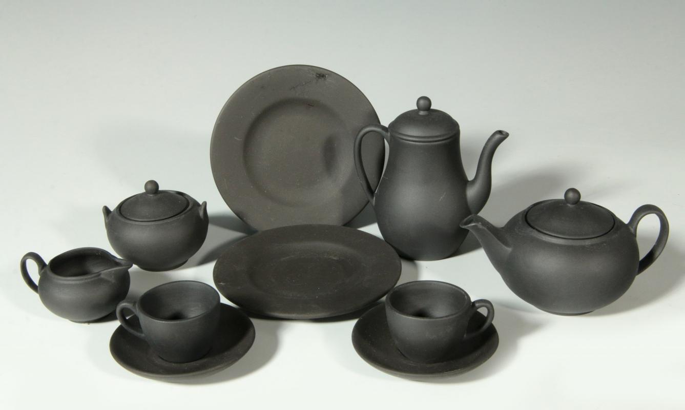 A WEDGWOOD BLACK BASALT CHILD'S TEA SET