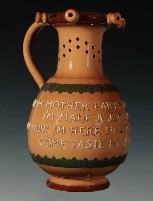 A 19TH CENTURY DOULTON LAMBETH PUZZLE JUG