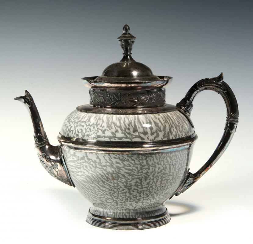 A RARE GRANITEWARE AND VICTORIAN SILVER PLATE TEAPOT
