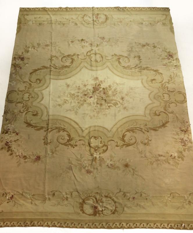 A 19TH CENTURY AUBUSSON RUG FRAGMENT