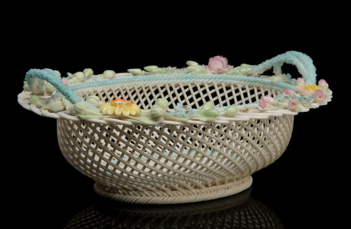 TWO IRISH BELLEEK PORCELAIN LATTICE BASKETS