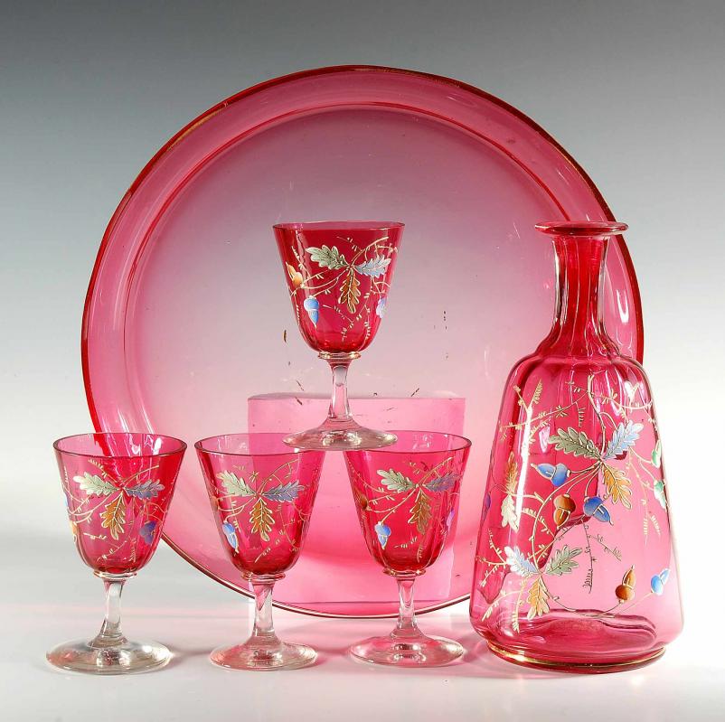 A 19TH C. BOHEMIAN ENAMELED CRANBERRY LIQUEUR SET