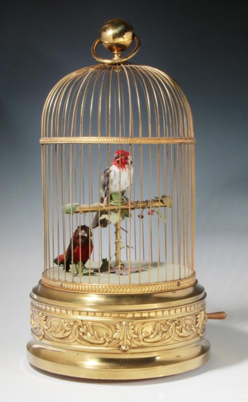 A 20C. SINGING BIRD MUSIC BOX -TWO AUTOMATON BIRDS