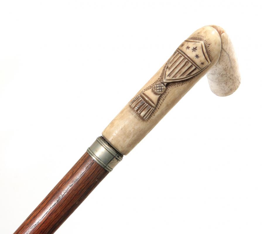 A 19TH C. CARVED FEDERAL SHIELD BONE HANDLE CANE