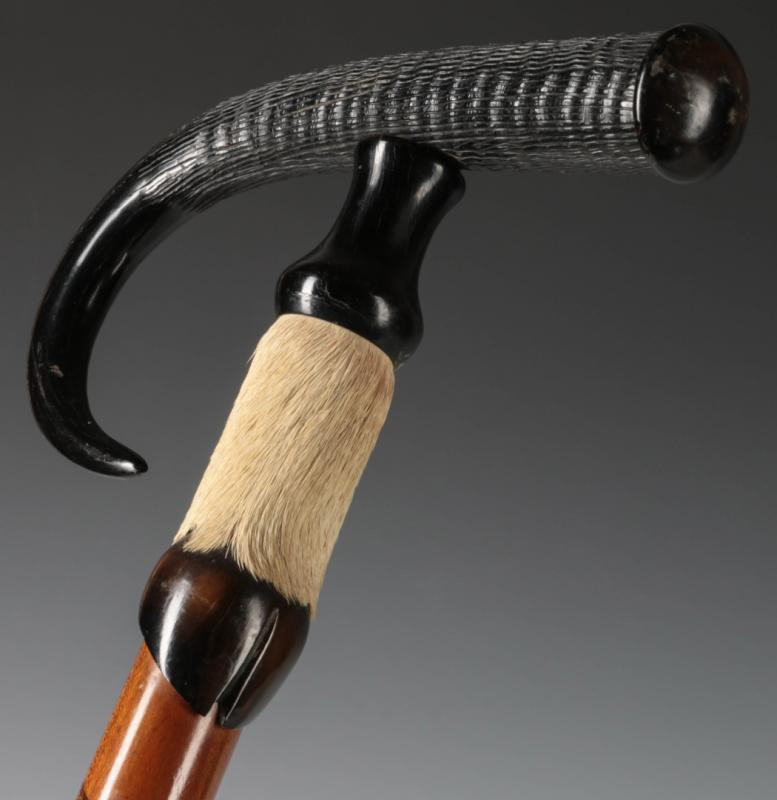 A 19C TRUMMELBACH-TYPE HORN AND HOOF WALKING CANE