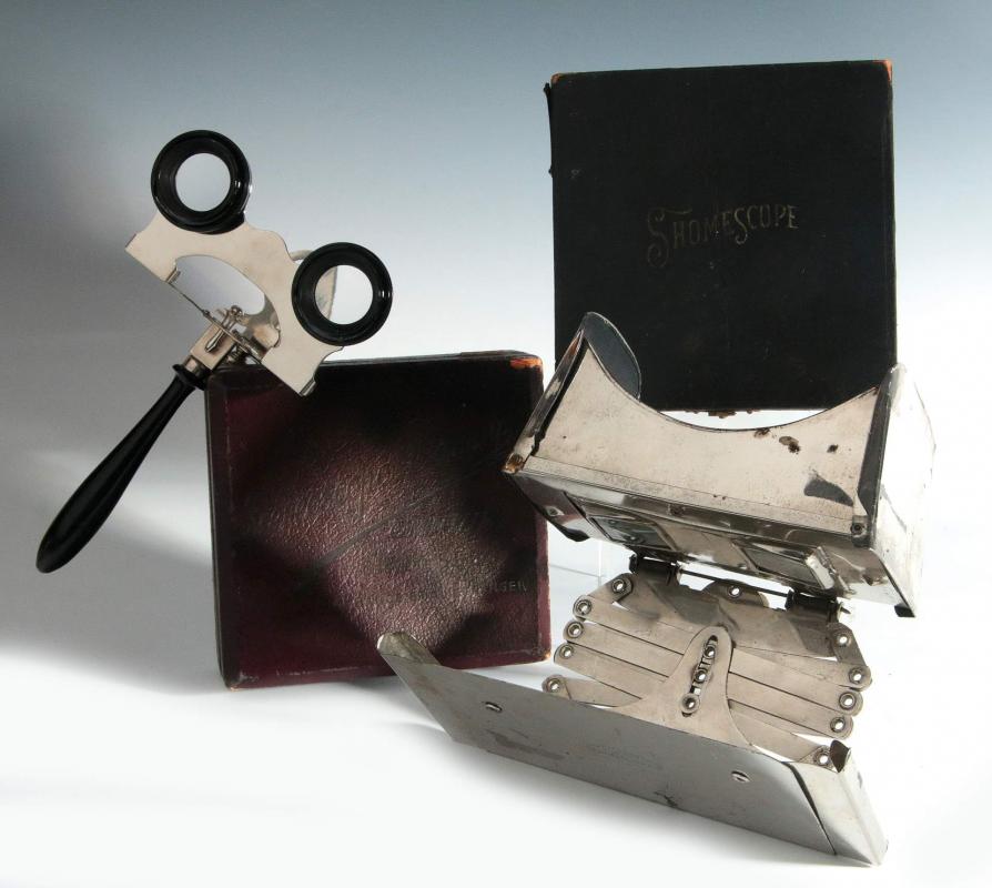 TWO 19TH CENTURY HAND-HELD STEREOSCOPES