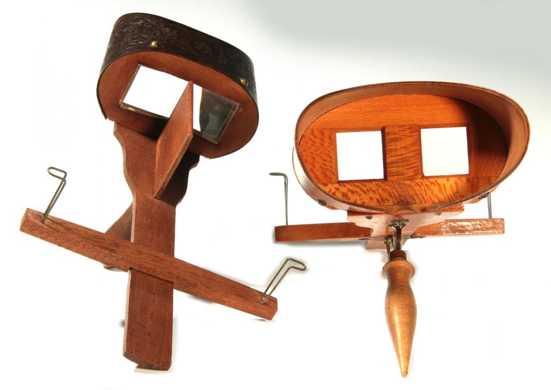 TWO CIRCA 1900 HAND-HELD STEREOSCOPES