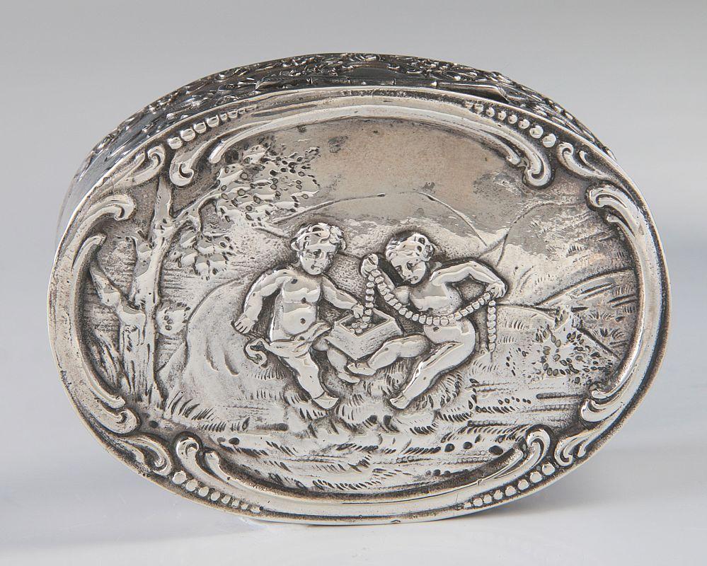 A 19TH C. CONTINENTAL .800 SILVER BOX WITH PUTTI