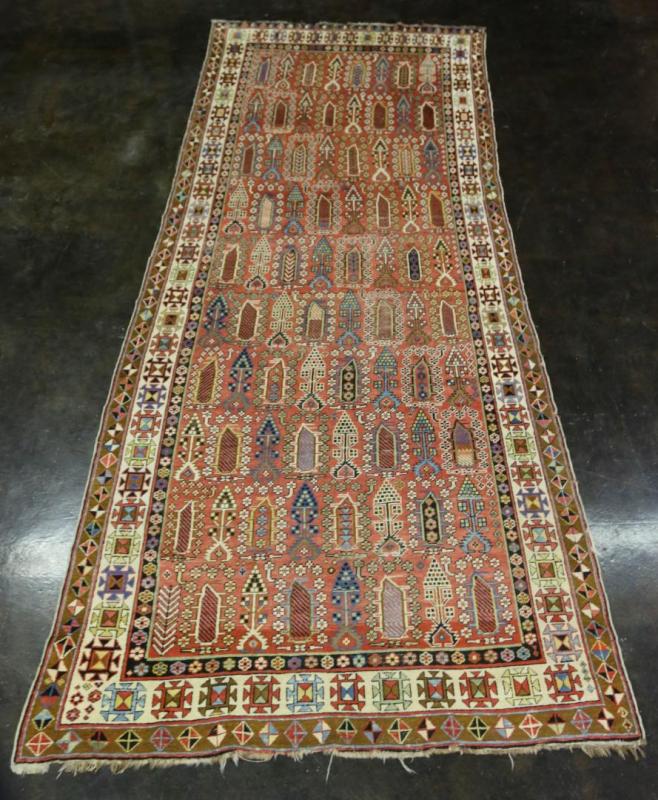 A GOOD ANTIQUE CAUCASIAN RUG 141 X 58 