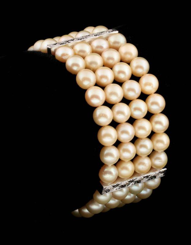 A PEARL, PLATINUM AND DIAMOND BRACELET