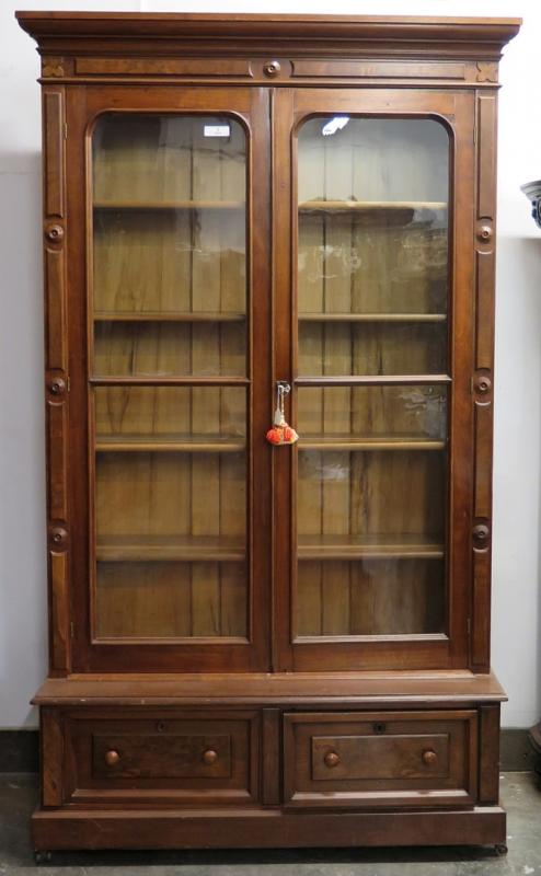 A 19TH CENTURY AMERICAN EASTLAKE WALNUT BOOKCASE