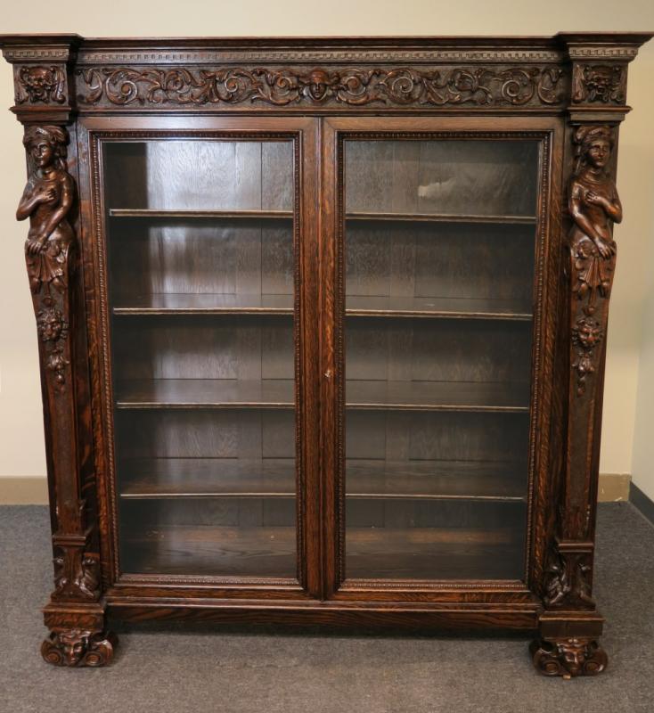 RJ HORNER FIGURAL CARVED OAK DOUBLE DOOR BOOKCASE