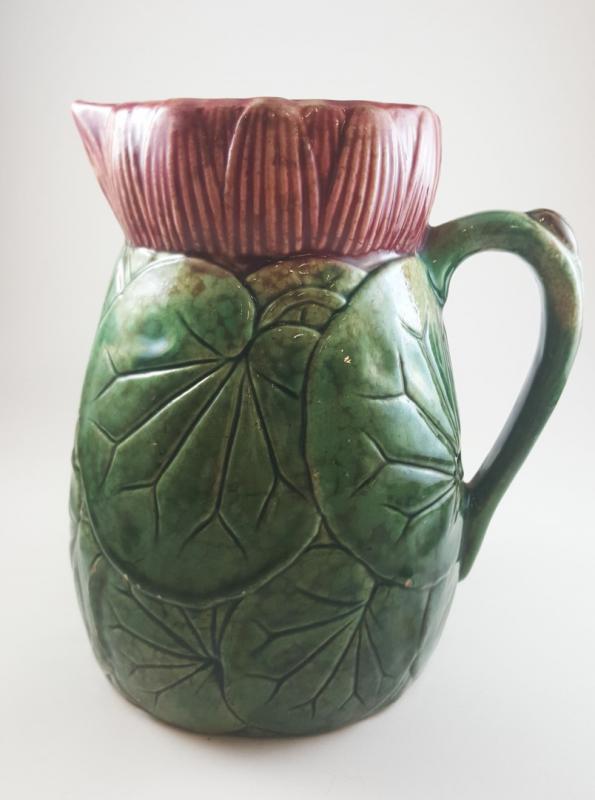 AN ANTIQUE MAJOLICA PITCHER