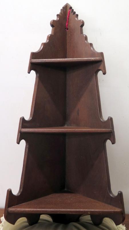 AN EARLY WALNUT VICTORIAN HANGING CORNER SHELF