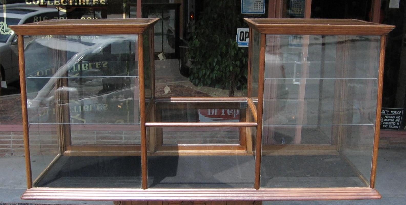 A QUARTERSAWN OAK DOUBLE TOWER DISPLAY CASE C. 188