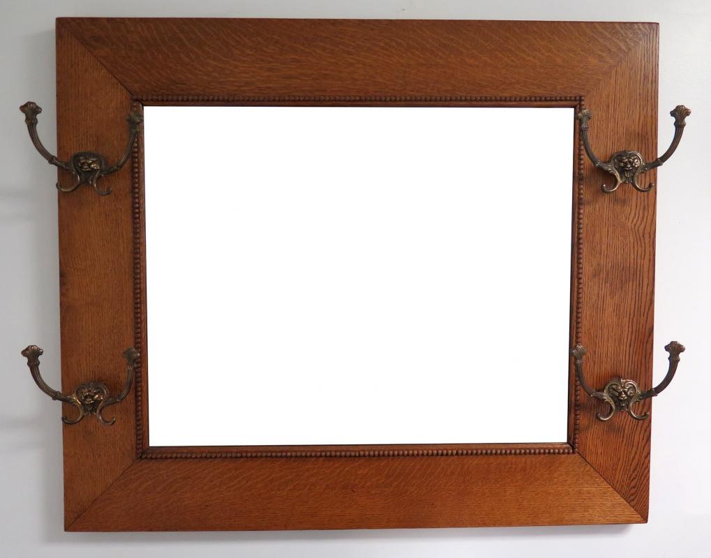 LARGE OAK HALL MIRROR WITH BRASS LION'S HEAD HOOKS