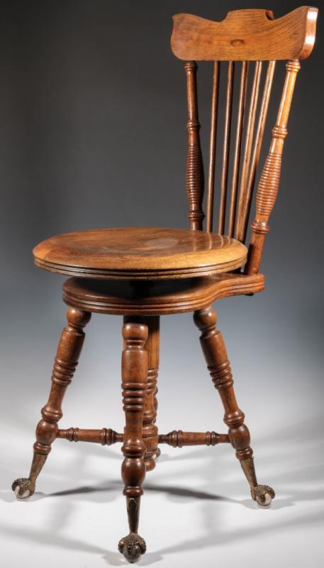 A CIRCA 1890 OAK HIGH BACK ORGAN STOOL