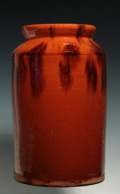 A 19TH C. REDWARE STORAGE JAR WITH MANGANESE 