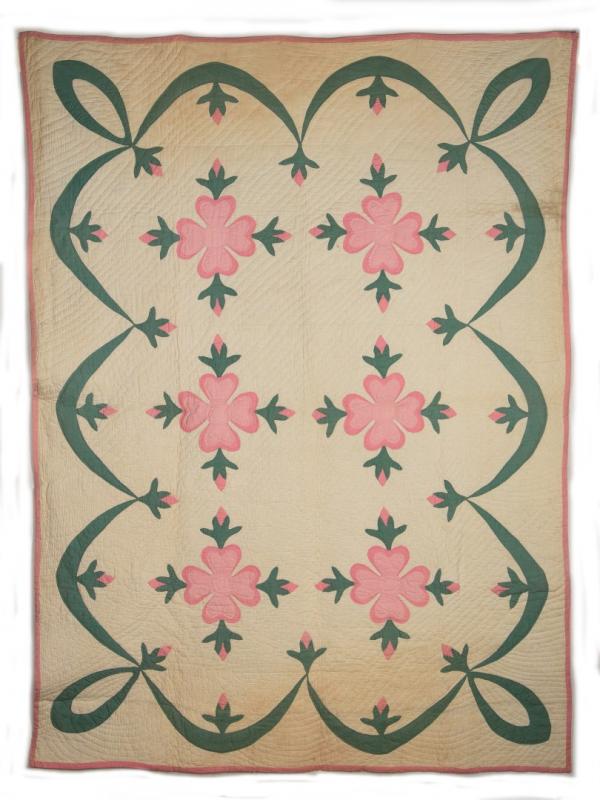 AN ANTIQUE APPLIQUE QUILT 'ROSE OF SHARON' PATTERN