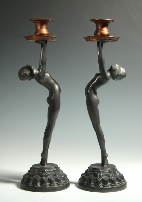 A PAIR OF ART DECO BACK-BENDING NUDE CANDLESTICKS