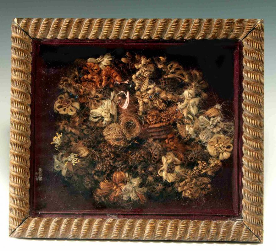 A 19TH C. WOVEN HAIR WREATH IN SHADOWBOX FRAME