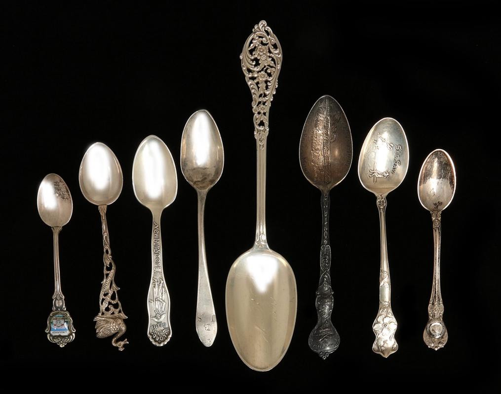 SEVEN STERLING SILVER SOUVENIR SPOONS PLUS ANOTHER